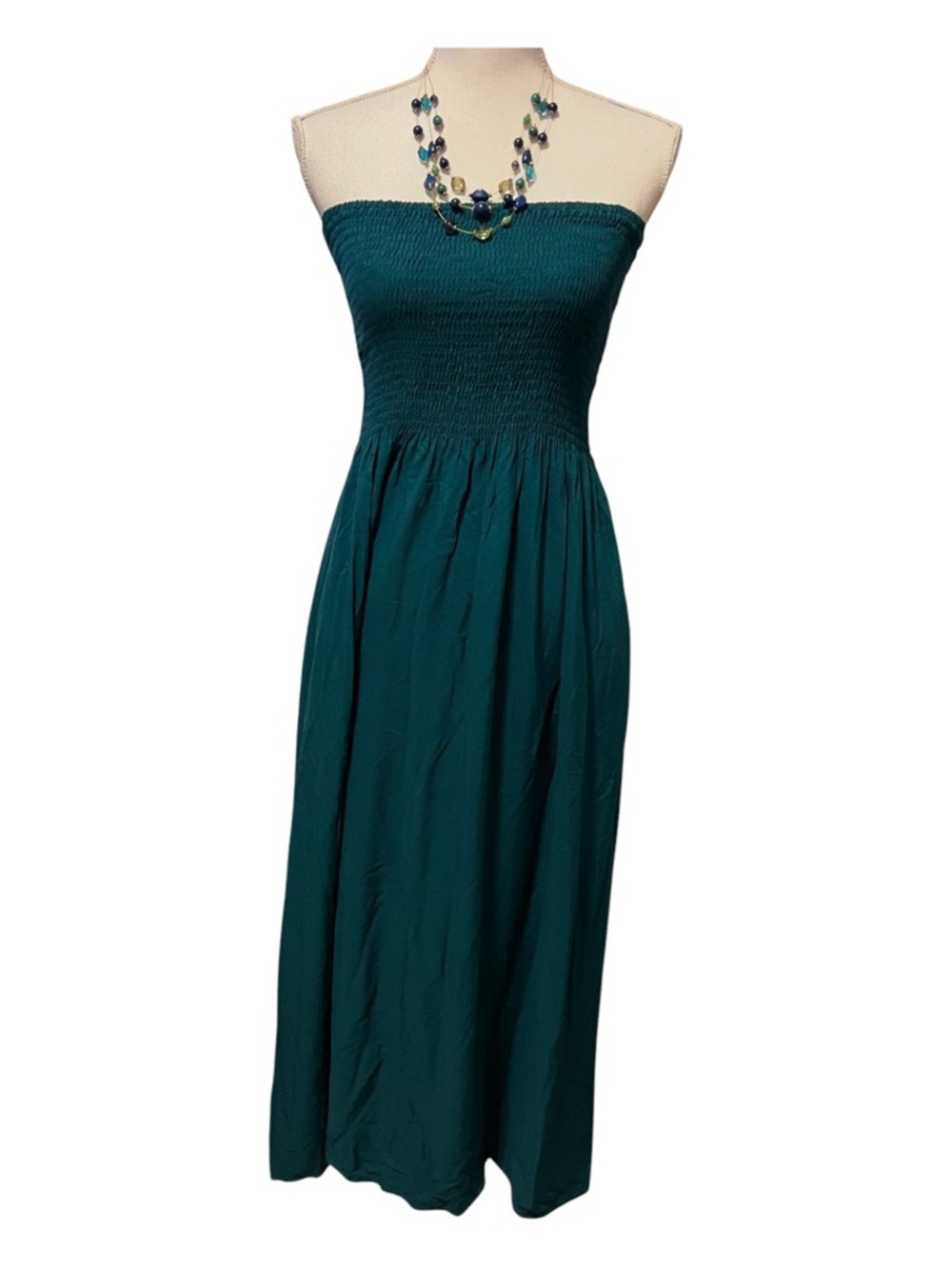 Dark emerald green strapless midi dress with pockets